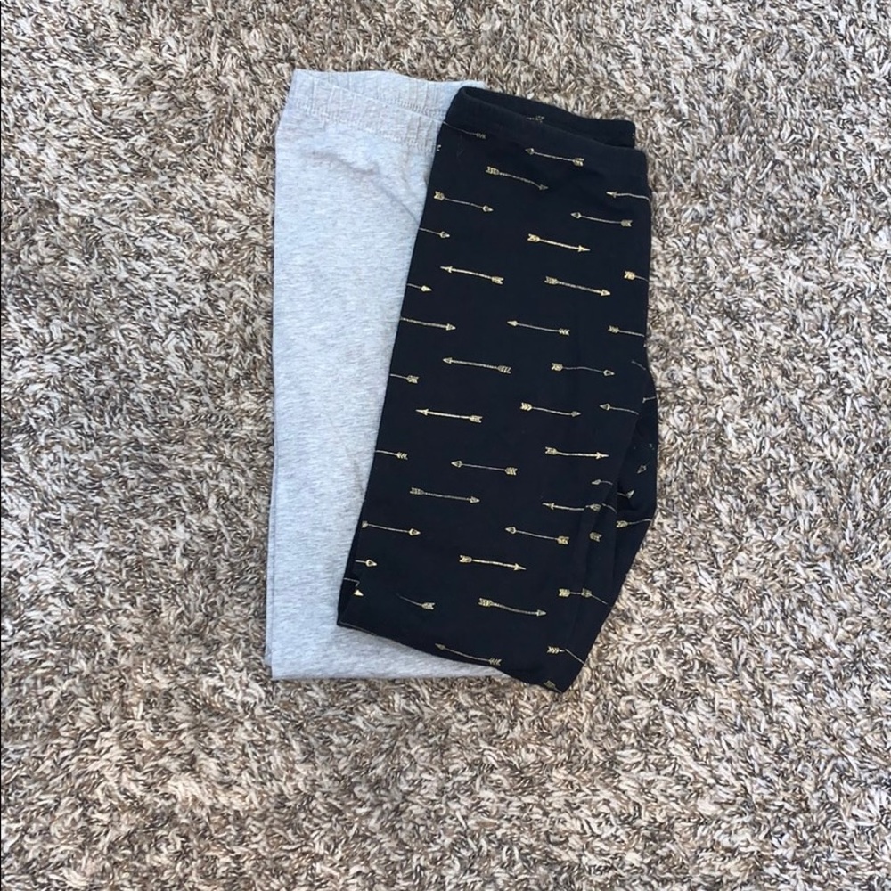 Gray leggings and black with gold leggings